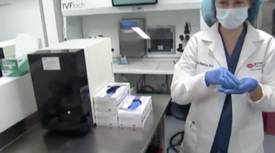 A lab technician freezing eggs