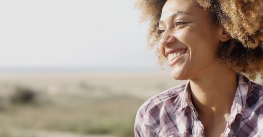 A woman smiling