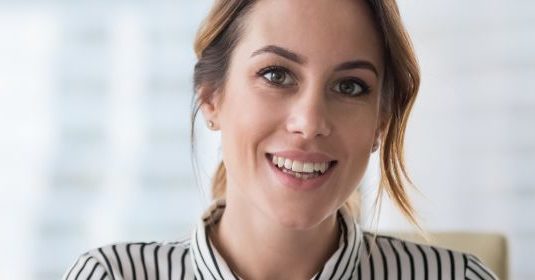 A woman smiling